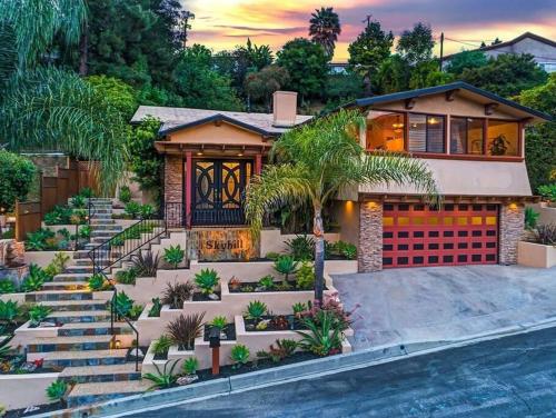 a house with a staircase leading up to it at Skyhill Oasis New Lux Designer Modern in Los Angeles
