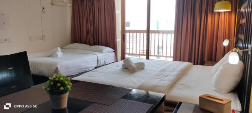 Postel nebo postele na pokoji v ubytování Sunway Resort Suites@Sunway Pyramid and Sunway Lagoon