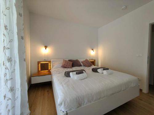 Ένα ή περισσότερα κρεβάτια σε δωμάτιο στο Villa Lea Marezige Koper