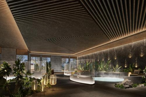 a rendering of a lobby with plants at Fairfield by Marriott Bijie in Bijie
