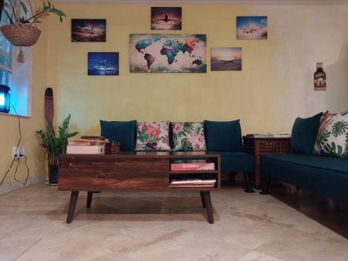 a living room with a couch and a coffee table at Private Guest House 2 bedrooms & 2 baths near Grace Bay Beach & Long Bay Beach. in Providenciales