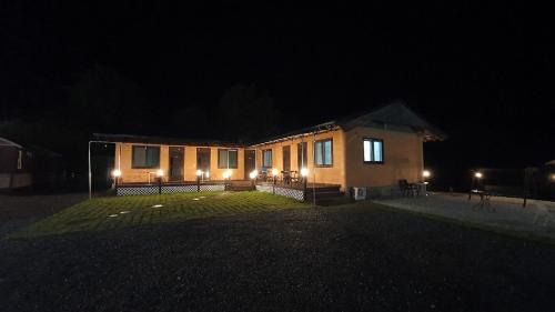 a small house at night with lights on it at Danyang Euljeon 56 Pension in Danyang