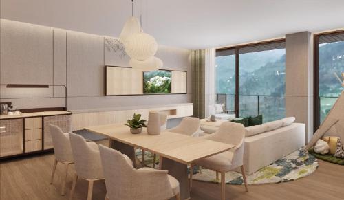 a kitchen and living room with a table and chairs at Royal Tulip Gunung Geulis Resort and Golf in Bogor