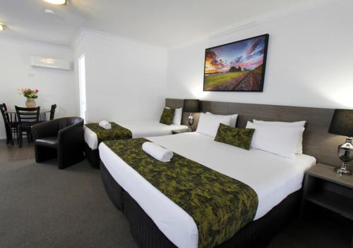Cama o camas de una habitación en Takalvan Motel