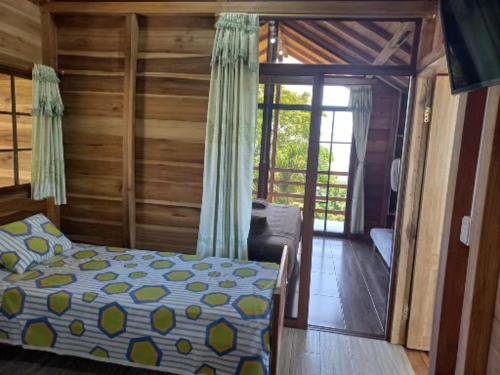 Postel nebo postele na pokoji v ubytování L'Oasis Don Juan