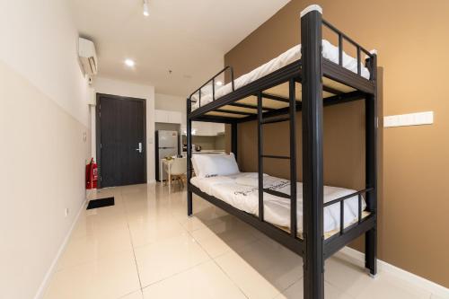 Katil atau katil-katil dalam bilik di HighPark Suites Kelana Jaya, Petaling Jaya by Sleepy Bear
