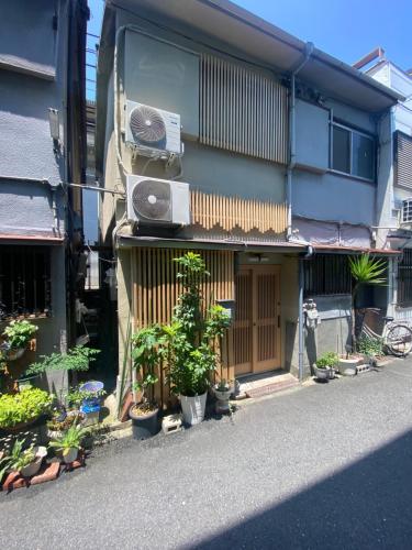 西九条駅徒歩2分USJと梅田と関空直通丸々貸切長屋koto