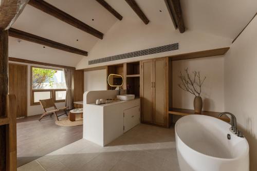 Fotografie z fotogalerie ubytování Shijing Hotel in Dali-大理柿井美宿 v destinaci Ta-li