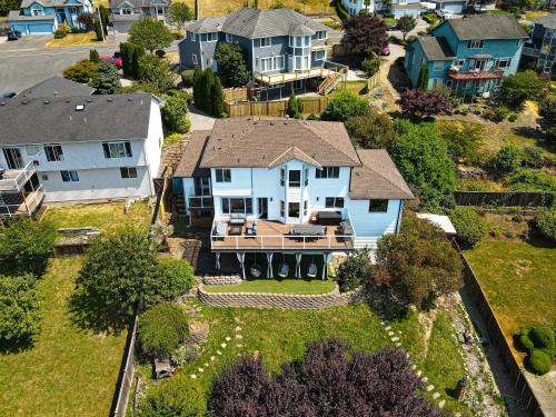 an aerial view of a large house at *NEW* Sunset Ridge Marysville 5 Beds 4 Baths in Marysville