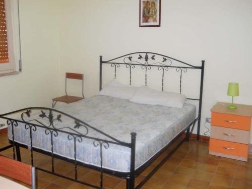 Ένα ή περισσότερα κρεβάτια σε δωμάτιο στο Catanzaro Lido - Trilocale Baia Azzurra