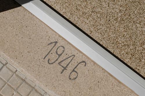 a sidewalk with the year written on it at Le Stanze di Felline- Monolocali vacanze- in Felline