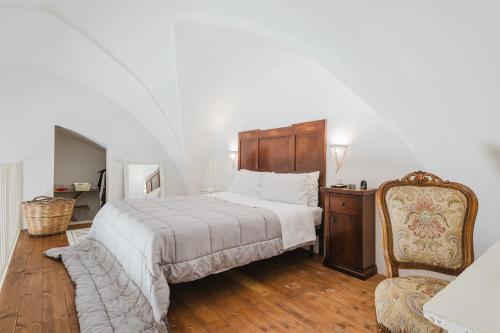 Postel nebo postele na pokoji v ubytování Le Stanze di Felline- Monolocali vacanze-
