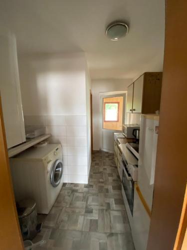 Dapur atau dapur kecil di Ferienwohnung Goldener Drache