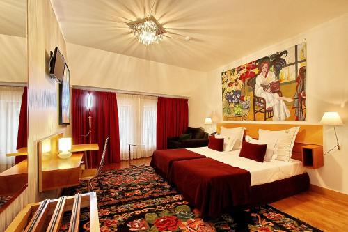 Postel nebo postele na pokoji v ubytování Hotel Mestre de Avis