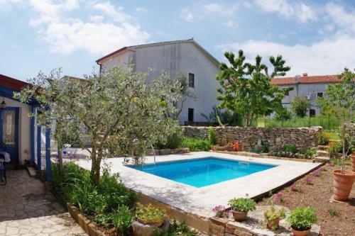 Πισίνα στο ή κοντά στο Ferienhaus mit private Swimingpool