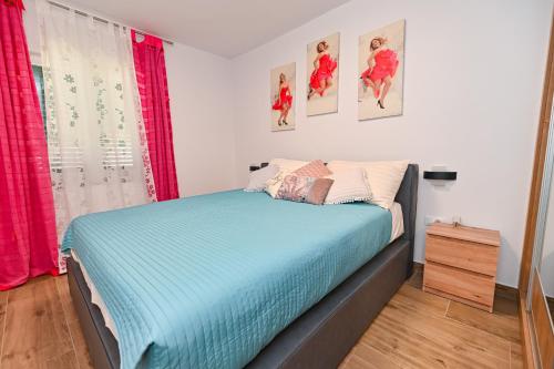 Ένα ή περισσότερα κρεβάτια σε δωμάτιο στο Apartman Mila
