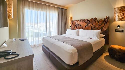 Postel nebo postele na pokoji v ubytování Event Tarifa by QHotels - Adults Recommended