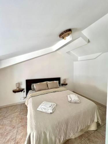Ένα ή περισσότερα κρεβάτια σε δωμάτιο στο Maison Camigliati