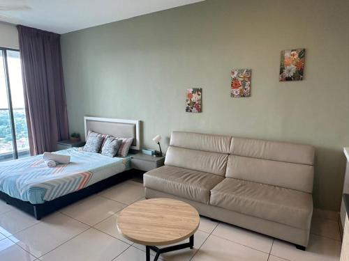 a living room with a bed and a couch at Evo Green Tea 25 with Netflix in Bandar Baru Bangi