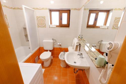 Koupelna v ubytování Apartmani Maltar