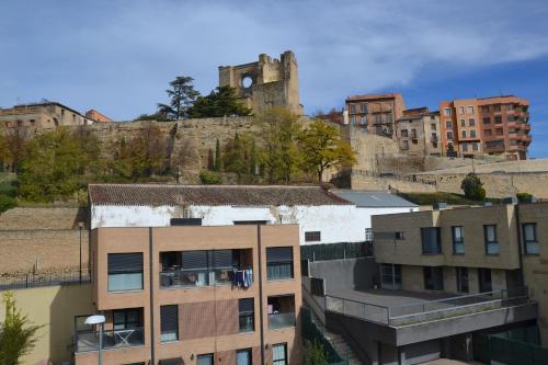 a view of a city with buildings and a castle at Los Borgia in Viana