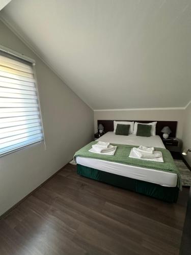 Cama o camas de una habitación en Fenix Apartments