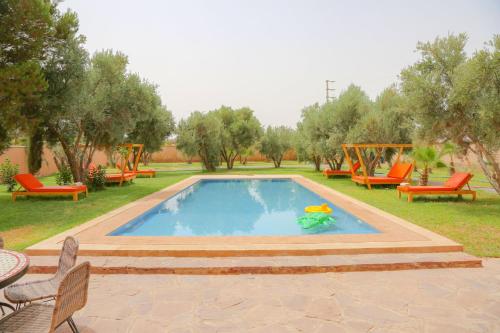 Piscina en o cerca de Domaine DAR JMEL & Dar Abi Samama