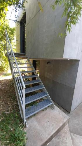a set of stairs leading to a building at La Villa Joséphine in Écully