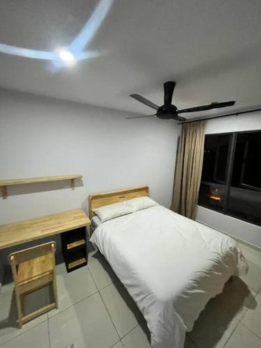 Postel nebo postele na pokoji v ubytování Mus lim Homestay Gaia Residence, Rawang
