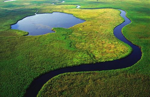 an aerial view of a river in a field at Birdville BNB Guest House in Gaborone