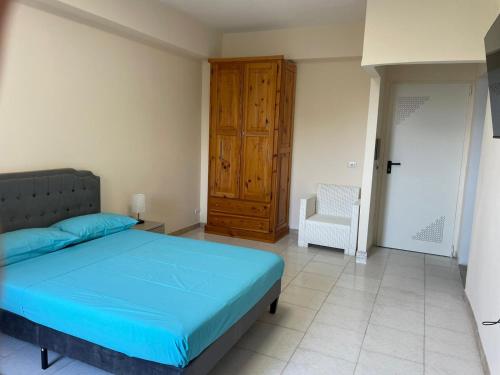 Postel nebo postele na pokoji v ubytování FONDO VERSACE