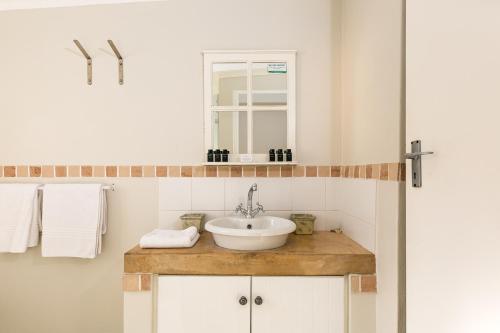 Ένα μπάνιο στο Langebaan Kite Cottages