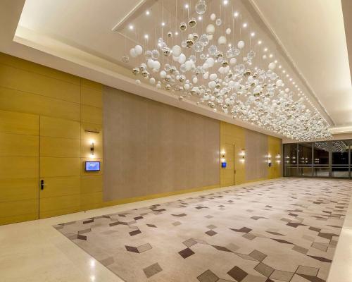 a large hall with a large chandelier in a building at Hyatt Regency Andares Guadalajara in Guadalajara