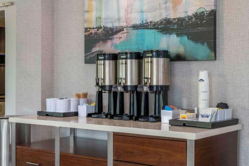 a counter in a room with a coffee maker at Hampton Inn Manchester Downtown in Manchester
