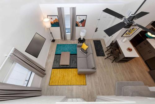 an overhead view of a living room with a couch at WaterWalk Extended Stay by Wyndham Atlanta Perimeter in Atlanta