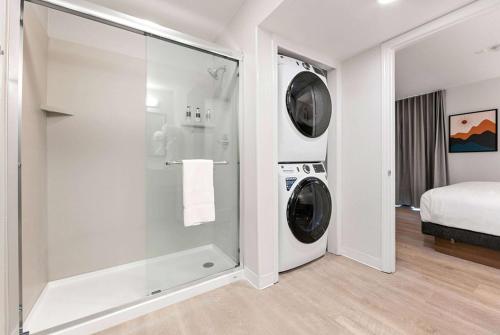 a laundry room with a washer and dryer at WaterWalk Extended Stay by Wyndham Atlanta Perimeter in Atlanta