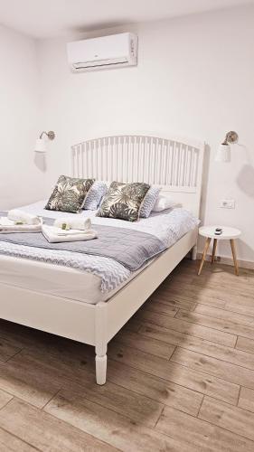 Ένα ή περισσότερα κρεβάτια σε δωμάτιο στο Guesthouse Augusta Insula