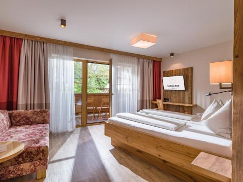 Postel nebo postele na pokoji v ubytování Hotel Sendlhof