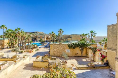 an aerial view of a resort with a pool at Villagg tal-Fanal in Għasri
