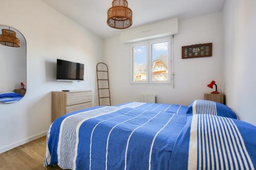 Katil atau katil-katil dalam bilik di 25m de la plage, vue mer, appartement pour 4