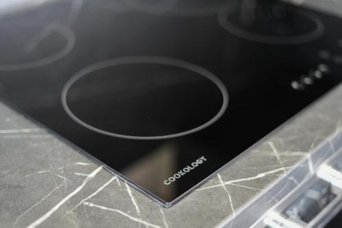 a close up of a control panel on a counter at The Olive Tree Aparthotel in Hull