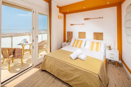 Postel nebo postele na pokoji v ubytování Hotel Karinzia