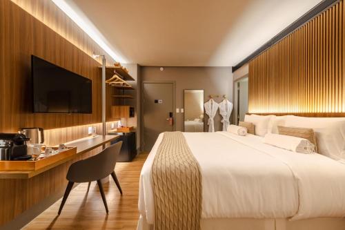 Ένα ή περισσότερα κρεβάτια σε δωμάτιο στο BA'RA Hotel
