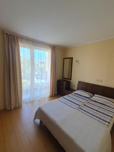 Postel nebo postele na pokoji v ubytování Sea Apartament Kristal Beach,Nessebar