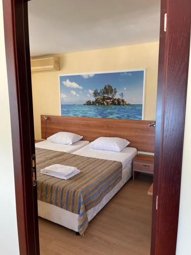 Postel nebo postele na pokoji v ubytování Hotel Star