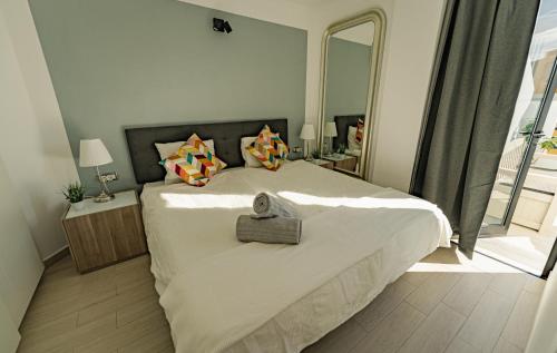 Ένα ή περισσότερα κρεβάτια σε δωμάτιο στο Penthouse-Wohnung Tomillo