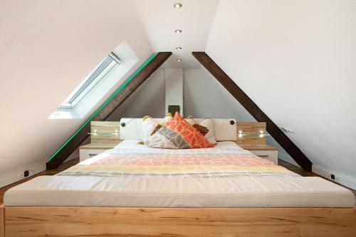 Postel nebo postele na pokoji v ubytování Villa Puppenhaus