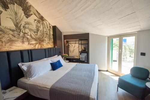 Postel nebo postele na pokoji v ubytování Hotel Leonessa