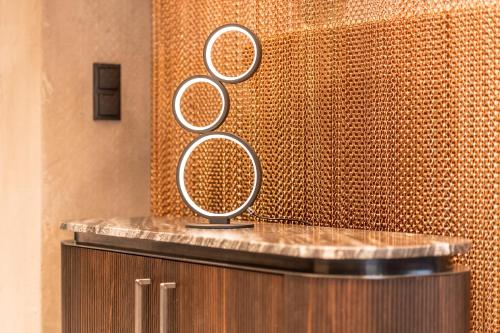 a group of tennis rackets sitting on top of a counter at Hotel Enzian Paznaun in See