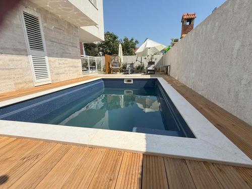 Kolam renang di atau dekat dengan Vila Regina Apartment Paloma with Swimming Pool